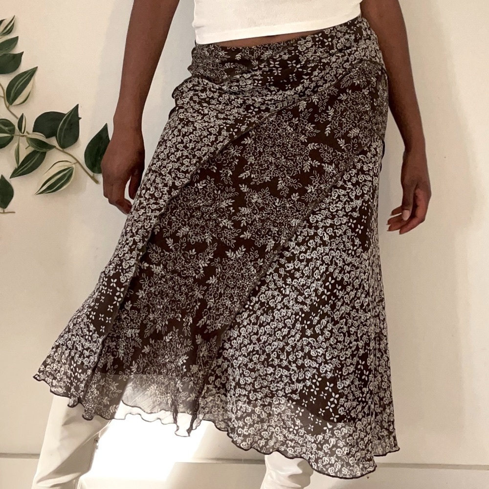 Black wrap midi skirt with asymmetrical hem for cocktail